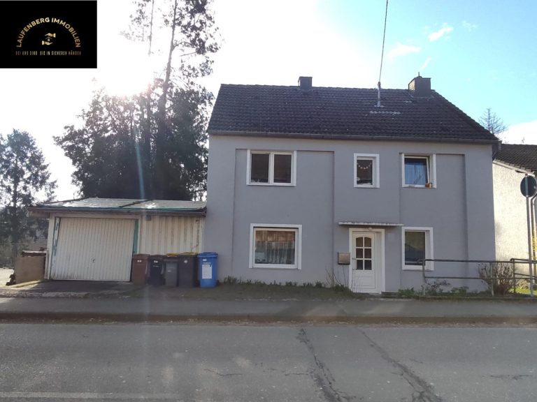 149.000 € / Freistehendes Zweifamilienhaus mit Anbau und Garten, Terrasse und Garage in ruhiger Wohnlage von Pracht nahe Hamm (Sieg)